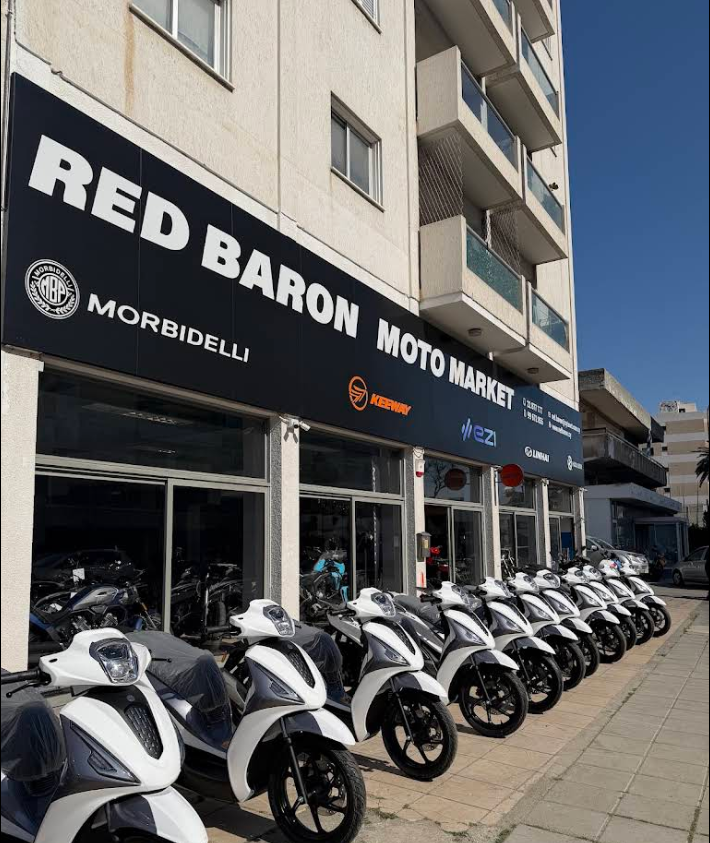 Red Baron Moto Market storefront with motorcycles on display